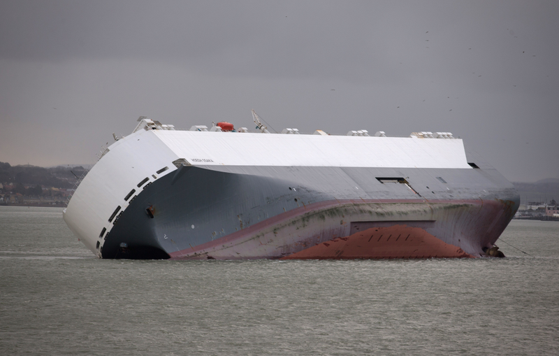 Illustration for article titled These Photos Of That Grounded Car Carrier Ship Are Beautifully Surreal